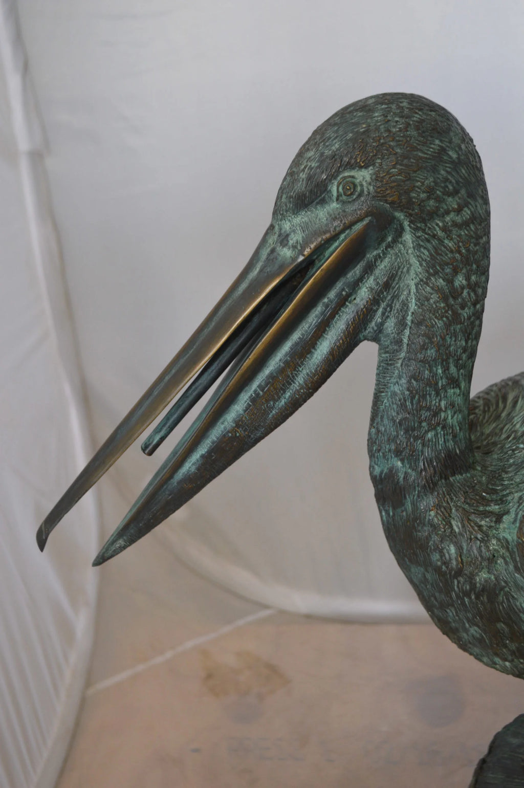 Nifao Pelican on a Tree Stump fountain bronze statue - Size: 30"L x 16"W x 46"H.